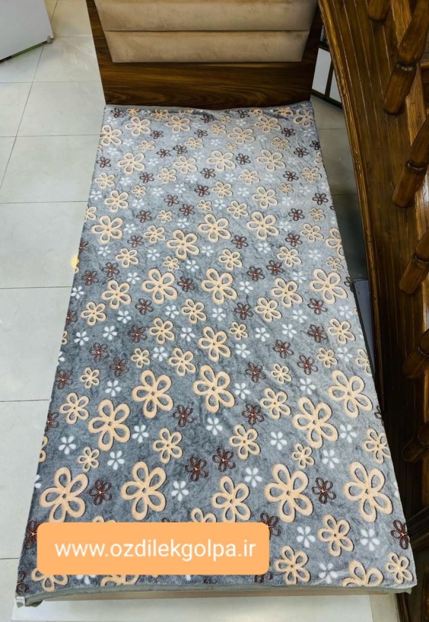 پتو ژله ای مسافرتی شبرنگ یکنفره طرح گل نارنجی